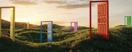 Colorful doorframes in a hilly field