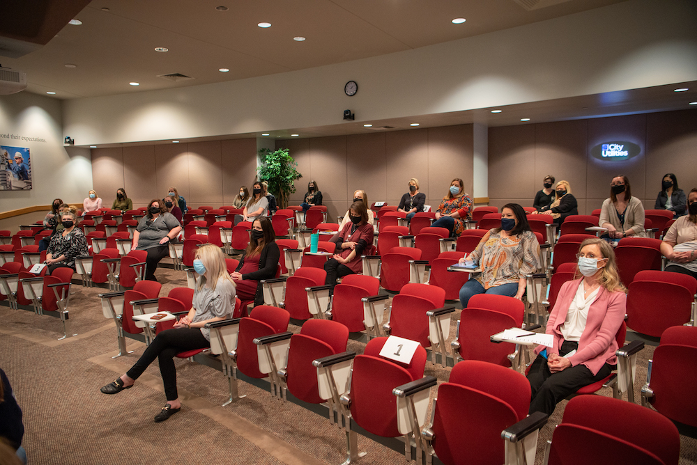 SWAG image of people meeting in a conference room