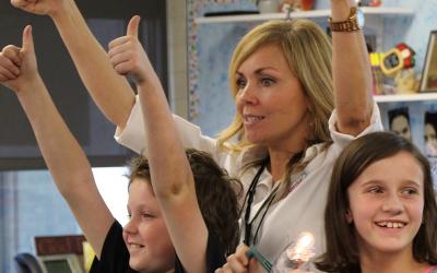 NEF energy education presenter and students in classroom