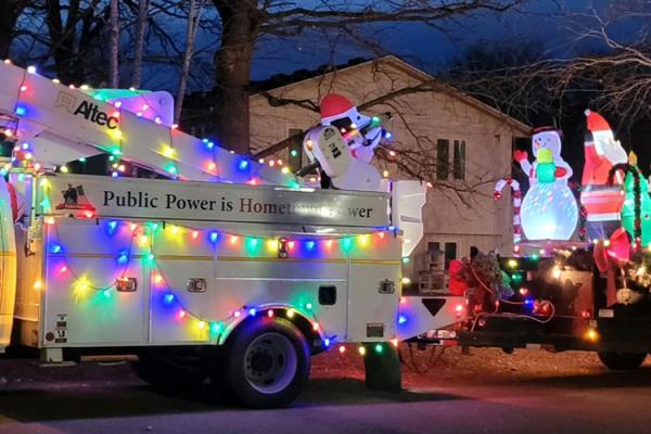 Princeton Public Utilities Commission bucket truck decorated for a Christmas parade